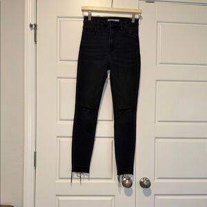 hidden black high waist skinny jeans with ripped knees